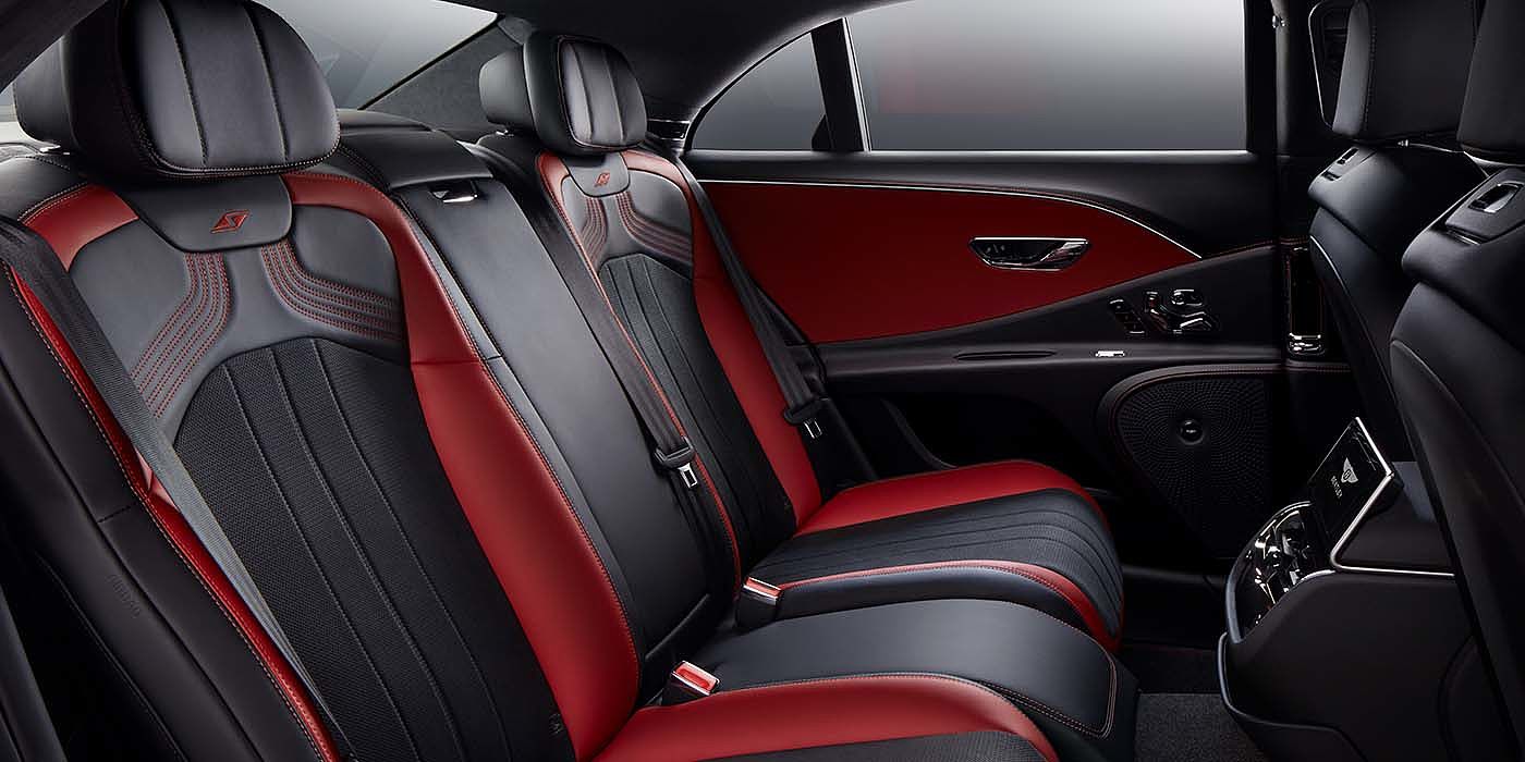 Bentley Taipei Bentley Flying Spur S sedan rear interior in Beluga black and Hotspur red hide with S stitching