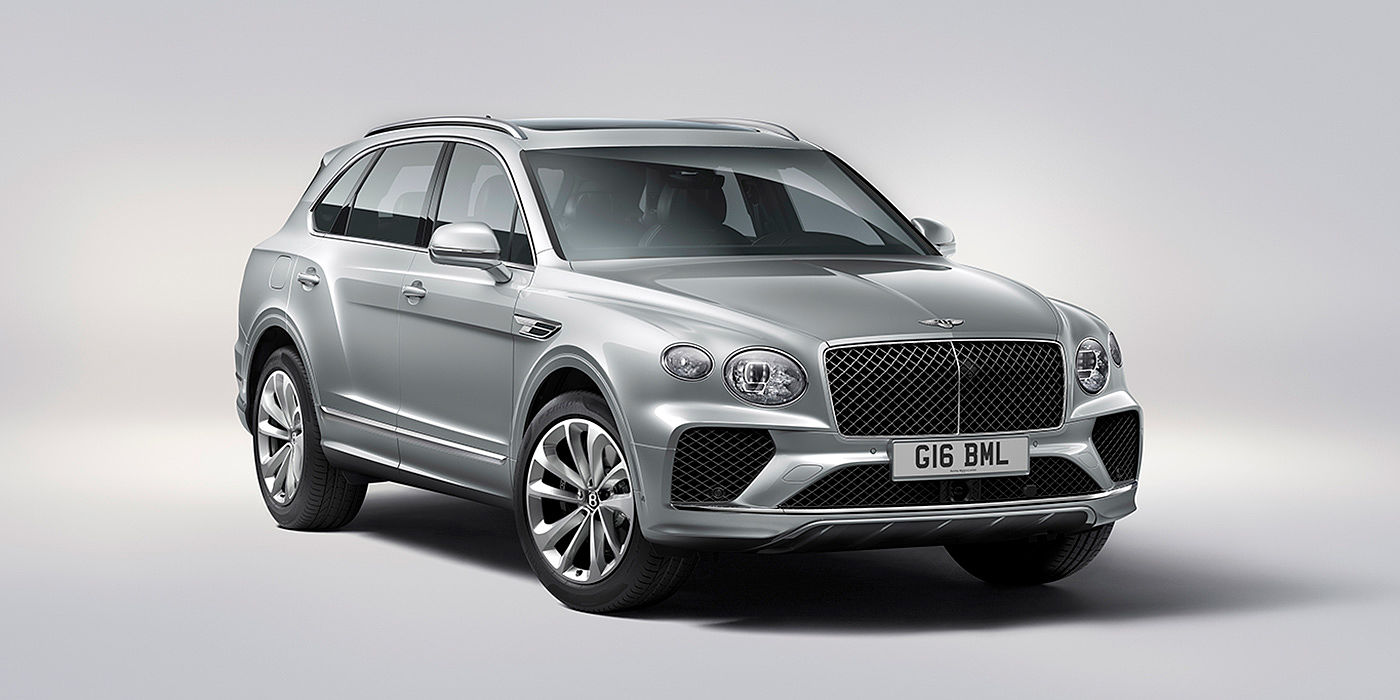 Bentley Taipei Bentley Bentayga in Moonbeam paint, front three-quarter view, featuring a matrix grille and elliptical LED headlights.