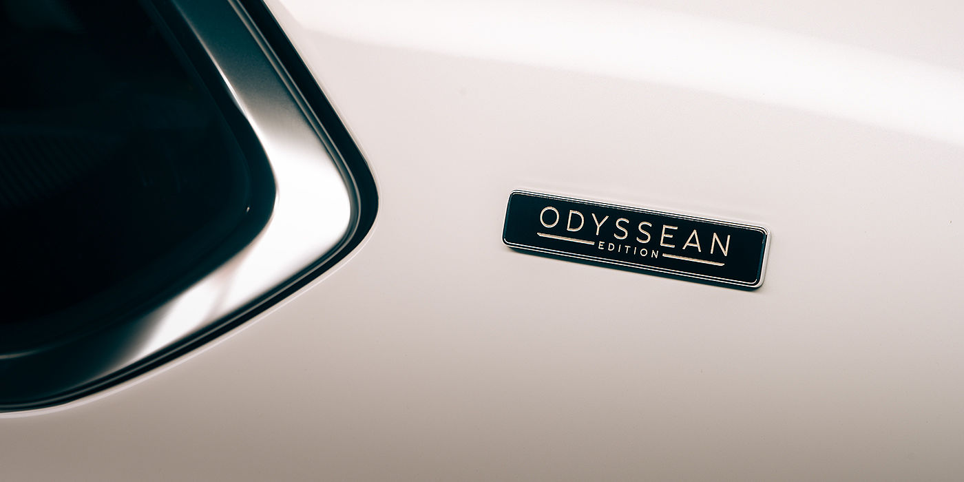 Bentley Taipei Bentley Bentayga Odyssean Edition SUV Odyssean badge close up with Snow Quartz Pearlescent by Mulliner paint