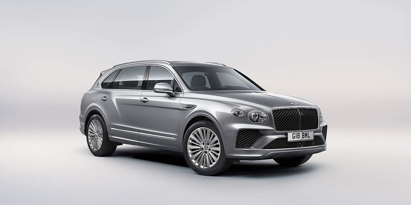 Bentley Taipei Bentley Bentayga Extended Wheelbase luxury SUV front three quarter view in Moonbeam paint with 21 inch five spoke painted wheels
