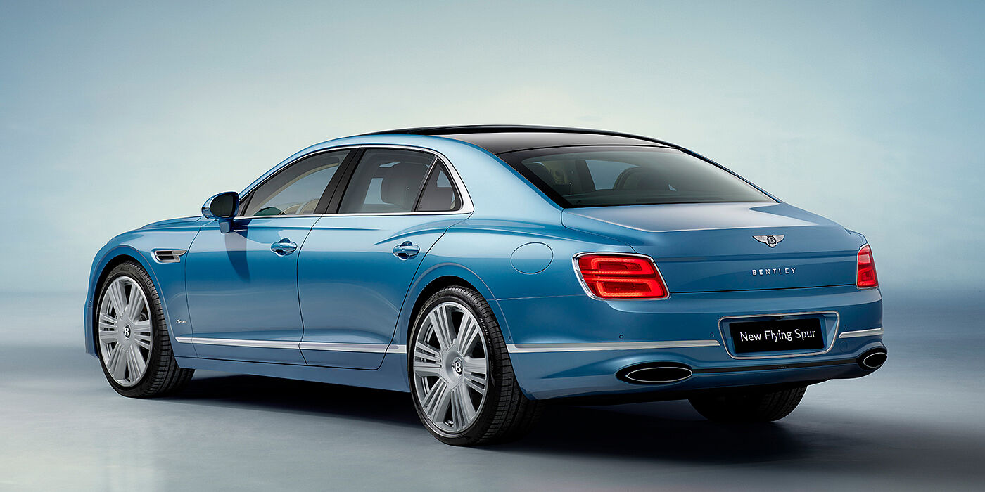 Bentley Taipei New Bentley Flying Spur Azure sedan rear view in Light windsor blue by Mulliner paint with 22 inch Azure wheels and chrome exterior details
