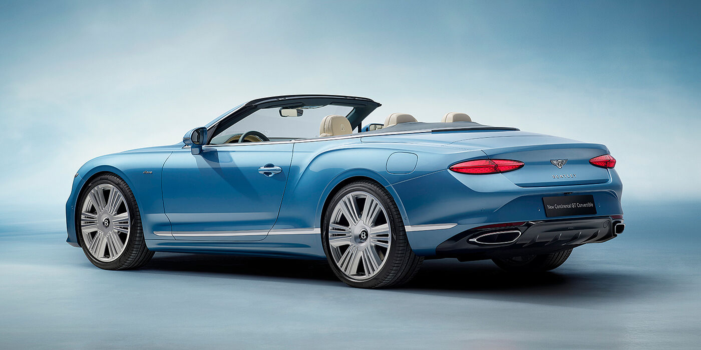 Bentley Taipei New Bentley Continental GTC Azure convertible rear view in Light Windsor blue paint with 22 inch ten spoke wheels and chrome exterior details