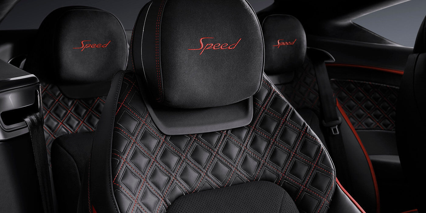 Bentley Taipei Bentley Continental GT Speed coupe seat close up in Beluga black and Hotspur red hide