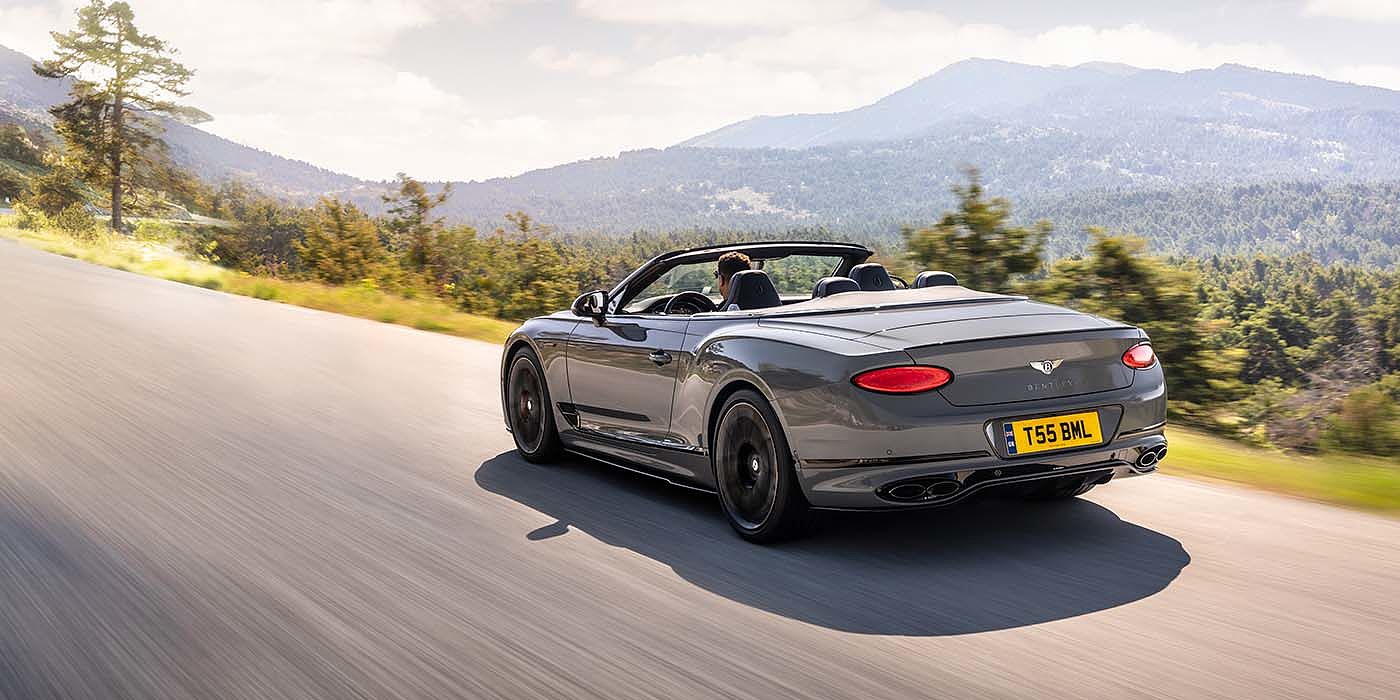 Bentley Taipei Bentley Continental GTC S convertible in Cambrian Grey paint rear 34 dynamic driving