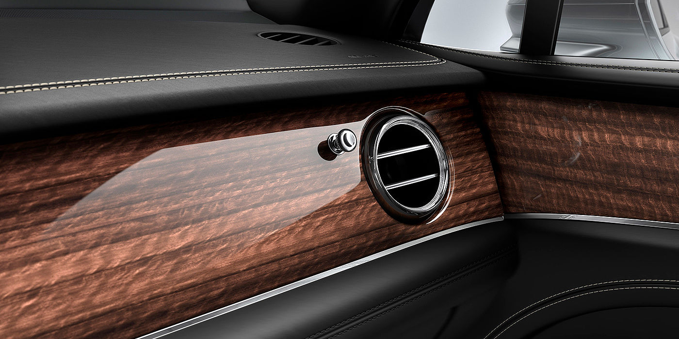 Bentley Taipei Bentley Bentayga front interior Crown Cut Walnut veneer and chrome air vent.