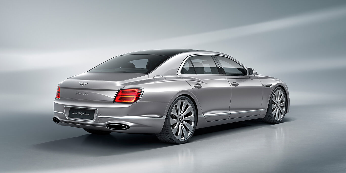 Bentley Taipei New Bentley Flying Spur sedan rear view in Silverlake paint with ten spoke wheels and chrome matrix grille